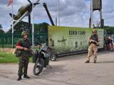 RE ENACTORS AT EDEN CAMP HURRICANE IN BACKGROUND